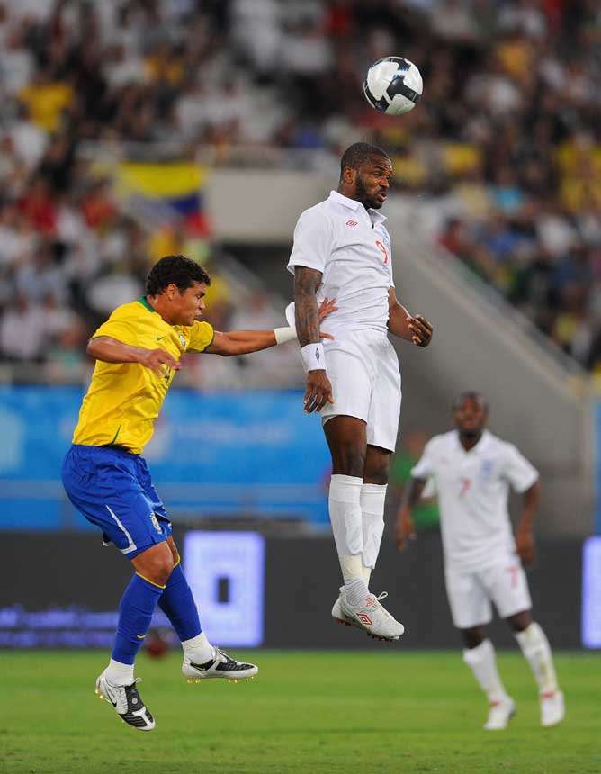 Darren Bent climbs to head the ball